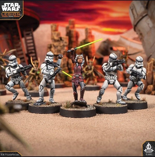 Ahsoka Tano raising a lightsaber among clone troopers